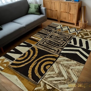 May include: A geometric patterned rug with black, white and gold accents. The rug features a patchwork design with various shapes and lines.