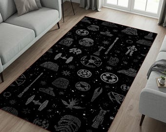 May include: A rectangular area rug featuring a black background with a repeating white pattern of various space-themed icons, including helmets, starships, and circular emblems, arranged in a scattered, star-filled galaxy design.