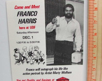 May include: A black and white photograph of Franco Harris, a football player, holding a glass of milk. The photo is on a white flyer advertising a meet and greet with Franco Harris at United Dairy Farms on 1st December from 1:30 to 3:00 PM. The flyer also states that Franco will autograph his life-like action portrait by Artist Marty Wolfson.