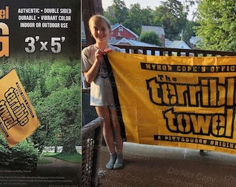 May include: A yellow flag with black text that reads "The Terrible Towel" and "FLAG". The flag is 3 feet by 5 feet and is double-sided. The flag is shown on a porch and in its packaging.
