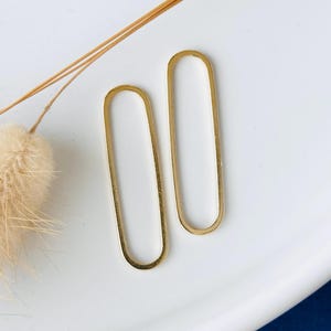 2 ringen 33x9 mm, verbindingsstukken, ovaal, rond, 18k verguld messing, set van 2