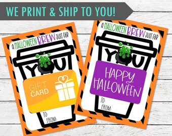 May include: Two Halloween-themed gift card holders. One has a gold gift card, the other says "Happy Halloween." Both feature a coffee cup design with a cauldron of green potion. Text reads "A Halloween Brew Just For You."