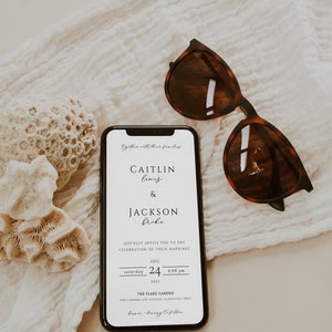 May include: A wedding invitation on a smartphone screen with a white background and black text. The invitation reads "Caitlin Lewis & Jackson Broke joyfully invite you to the celebration of their marriage August 24, 2021, 4:00 pm The Flake Garden 7006 Rhodes Ave Chicago Illinois 60637 Dinner & Dancing to Follow."