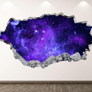 May include: A wall decal featuring a 3D effect of a hole revealing a vibrant galaxy. The image showcases a deep space scene with shades of purple, blue, and white, framed by a textured, gray, concrete-like border.