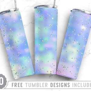 May include: Three stainless steel tumblers with a blue, iridescent, and glitter design. The tumblers are 20 ounces each and are perfect for everyday use.