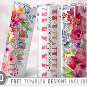 May include: Three stainless steel tumblers with a floral design. The tumblers are white with a pink, red, and yellow floral pattern. The middle tumbler has the text "JULIAN EVELYN OLIVER" in pink and red letters.