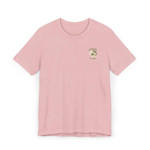 May include: A set of three ceramic mugs with a speckled, matte finish. The mugs are in shades of cream, light grey, and dark grey. Each mug has a simple, minimalist design and a rounded handle. Ideal for tea or coffee.