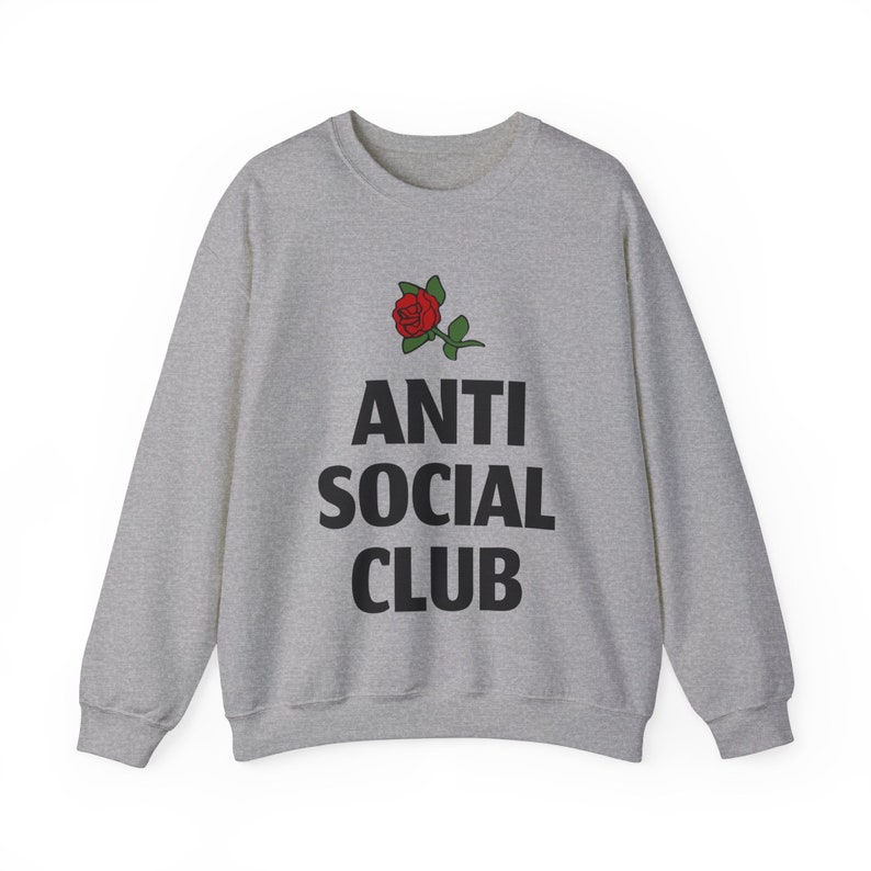 May include: A gray sweatshirt with the text "ANTI SOCIAL CLUB" in black letters and a red rose graphic.