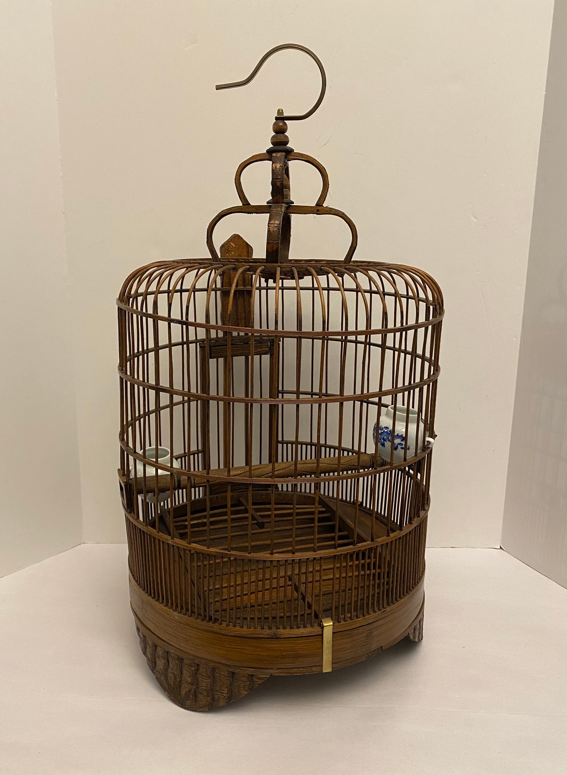 Vintage 25 Bamboo Bird Cage W/2 Pottery Feeders and Brass Hook. 