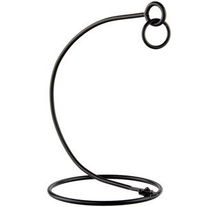 May include: Black metal ornament stand with a curved arm and a circular base.