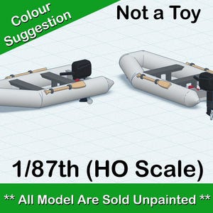 Pode incluir: Dois barcos infláveis brancos com motores de popa e remos, na escala 1/87 (escala HO). O texto "Not a Toy" e "All Model Are Sold Unpainted" é visível na imagem.