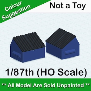 Peut inclure: Deux modèles de bennes à ordures bleues et noires à l'échelle 1/87e, également connue sous le nom d'échelle HO. Le texte "Not a Toy" et "All Model Are Sold Unpainted" est visible sur l'image.