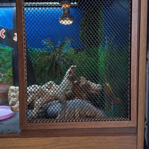 A Sliding Mesh Vivarium Door Panel made to measure