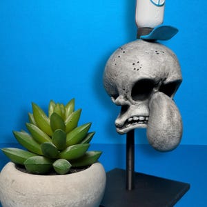 Calamardo diseñador de calaveras (Bob Esponja)