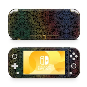 May include: A black and gold Nintendo Switch Lite console with a colorful, abstract pattern on the back. The screen displays the Nintendo Switch logo and the words "Nintendo Switch".