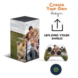 May include: A white Xbox Series X console with a custom design featuring a family of four and a dog. The design includes a photo of the family smiling and hugging, with the dog sitting in front of them. The console is on a white background.