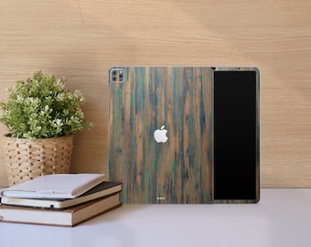 May include: A wood-grain patterned phone case with a green and brown color scheme. The case has a cutout for the camera lens and a white Apple logo.