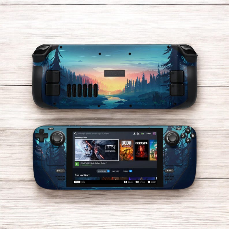 May include: A blue and black handheld gaming console with a forest scene on the back. The front screen shows a menu with recent games, including Star Wars Jedi: Fallen Order, Doom Eternal, and Control. The console has a joystick, buttons, and a screen.