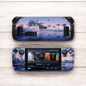 May include: A purple and black handheld gaming console with a tropical sunset design. The screen shows a menu with game titles like "Star Wars Jedi: Fallen Order" and "Doom Eternal".