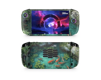 May include: A Lenovo Legion handheld gaming device, featuring a vibrant screen displaying a futuristic scene. The device has a green and teal patterned exterior with a koi pond design on the back. The word "LEGION" is visible.