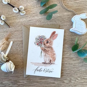 Osterkarte „frohe Ostern“ / Karte Ostern handgemalt / Osterhase Aquarell mit Kalligrafie Schriftzug und Blumenstrauß / Tulpen / A6