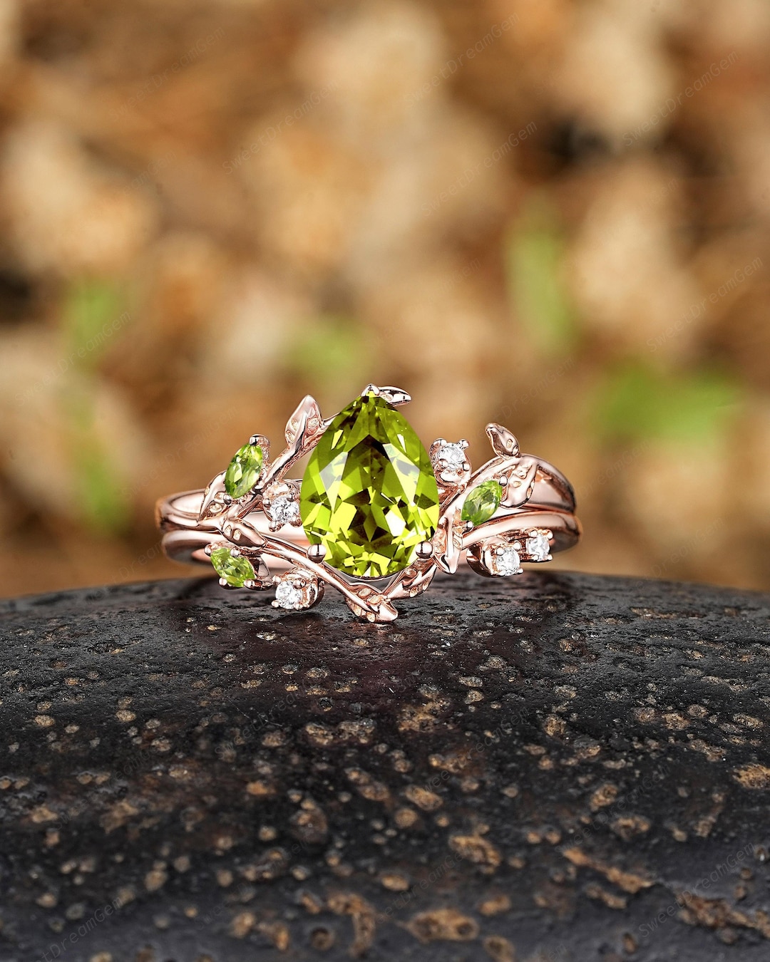 vintage-pear-shaped-peridot-engagement-ring-set-solid-gold-leaf-branch