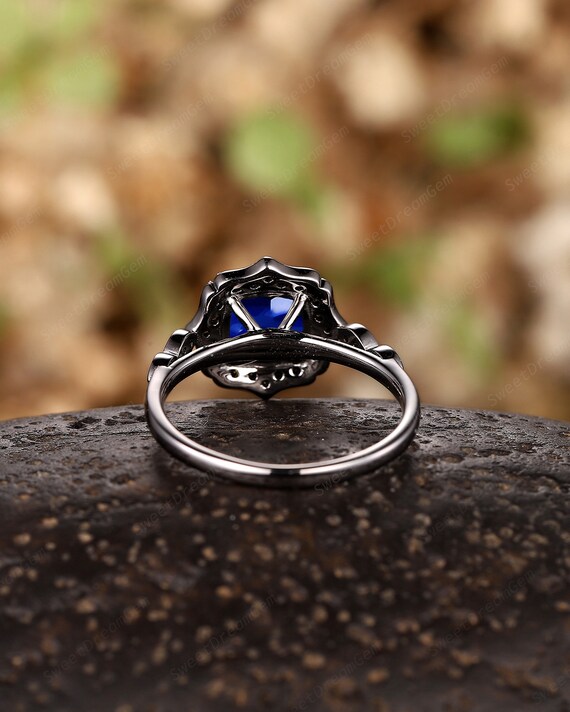 Black gold blue sapphire engagement rings discount