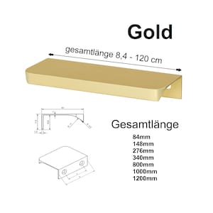 Könnte beinhalten: Goldene Schrank-Griff mit abgerundeter Kante und rechteckiger Form. Der Griff ist 8,4 bis 120 cm lang. Der Griff ist in verschiedenen Größen erhältlich: 84 mm, 148 mm, 276 mm, 340 mm, 800 mm, 1000 mm und 1200 mm.