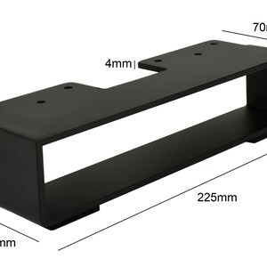 May include: A black metal bracket with a rectangular design. The bracket is 225mm long, 70mm wide, and 49mm high. It has a thickness of 5mm and a 4mm cutout. The bracket has pre-drilled holes for mounting.