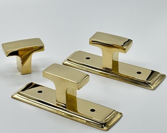 Nielakierowana, polerowana, prostokątna gałka z mosiądzu z fazowaną płytką tylną, solidna