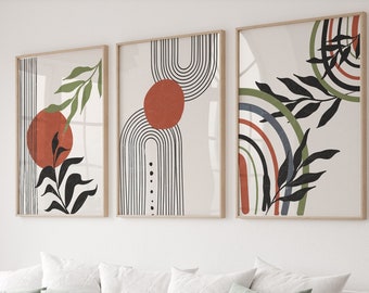 May include: Three abstract art prints with a white background and black, green, and red geometric shapes. The prints feature a stylised leaf design and a rainbow-like arc.
