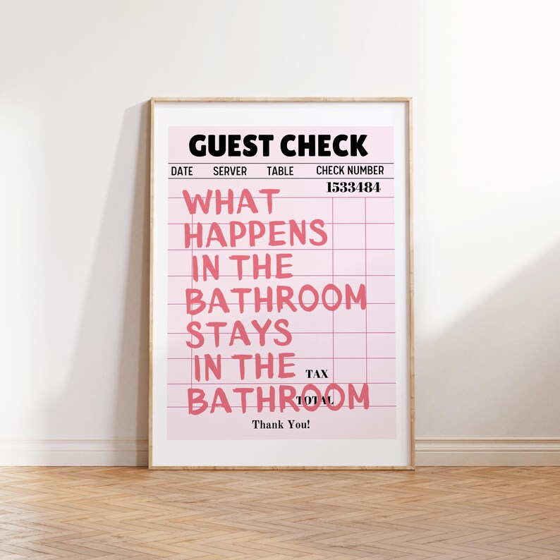 May include: A pink and white guest check with the text "GUEST CHECK" at the top and the phrase "WHAT HAPPENS IN THE BATHROOM STAYS IN THE BATHROOM" in black text. The check number is 1533484.