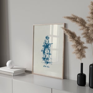 May include: A blue and white illustration of a cowboy riding a horse with the text "Ride slow" printed below the image.
