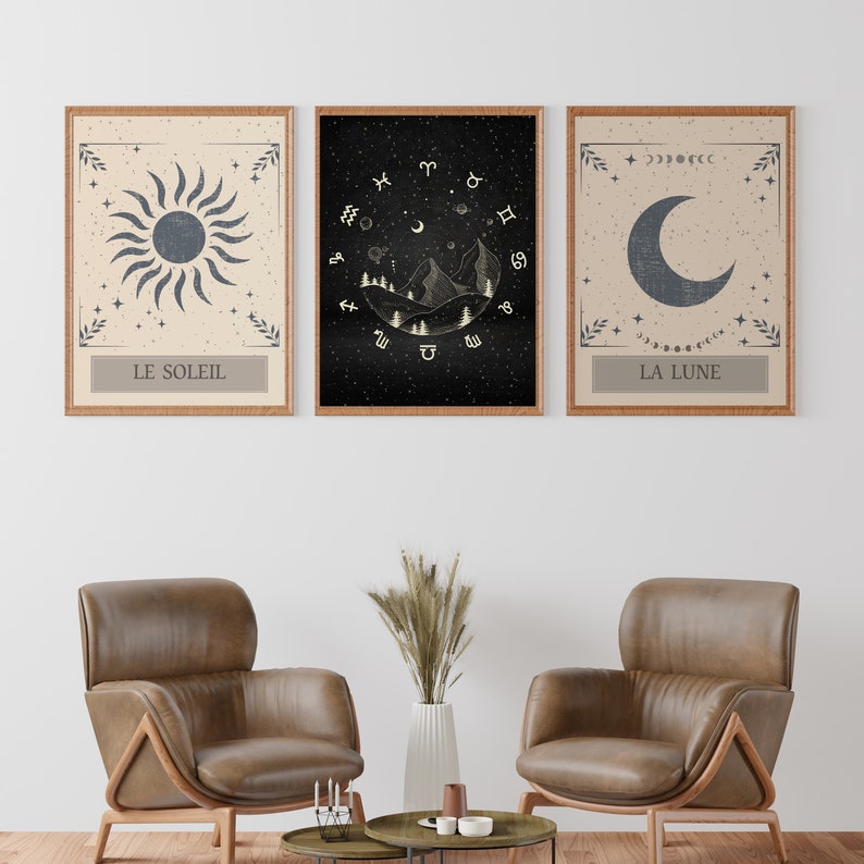 May include: Three framed prints with celestial imagery. The left print features a sun with the text "Le Soleil". The center print features a mountain range with celestial symbols and the text "Le Soleil". The right print features a crescent moon with the text "La Lune".