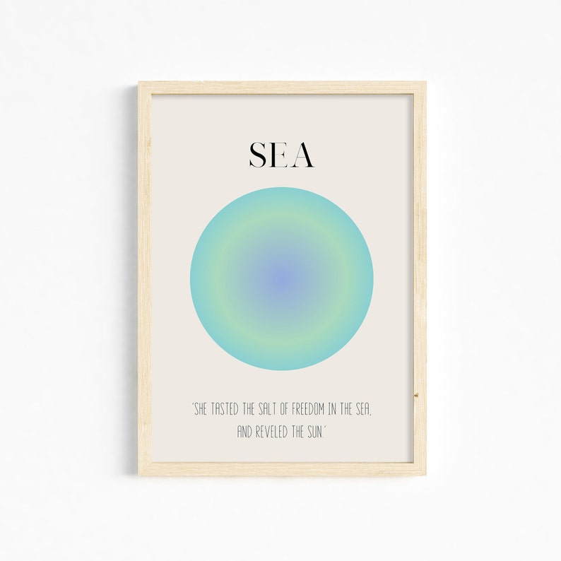 May include: A minimalist poster with the word "SEA" in black text on a beige background. A blue, green, and yellow gradient circle is in the center of the poster. The quote "SHE TASTED THE SALT OF FREEDOM IN THE SEA, AND REVELED THE SUN" is below the circle.