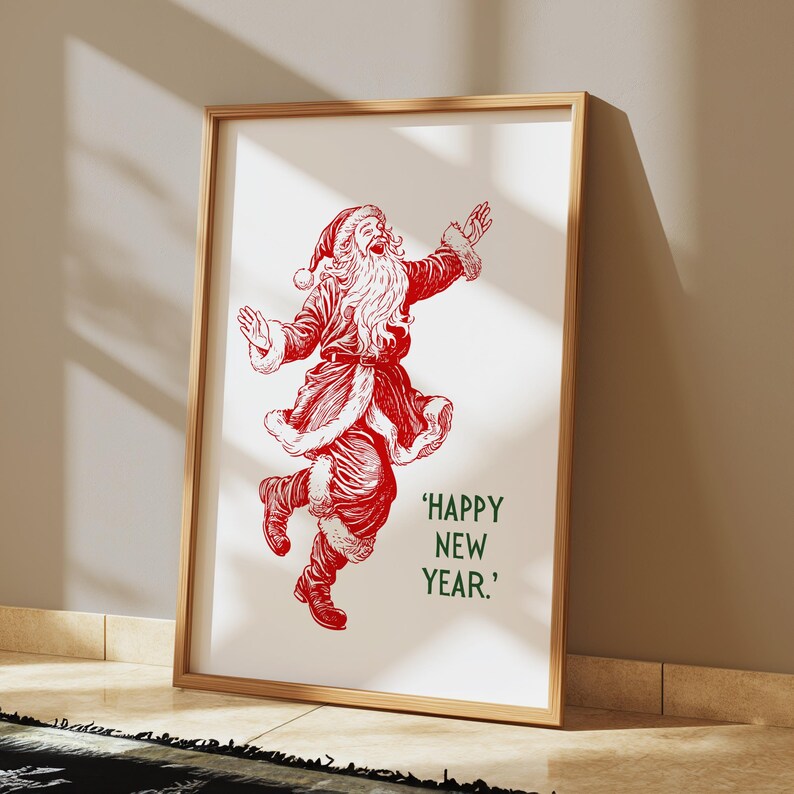May include: A framed print of a red illustration of Santa Claus dancing with the text 'HAPPY NEW YEAR.'