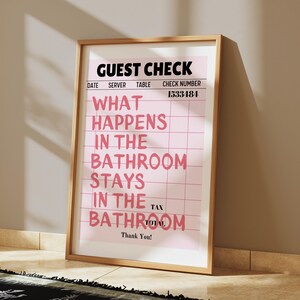 May include: A pink and white guest check with the text "What happens in the bathroom stays in the bathroom" in black text. The check number is 1533484.