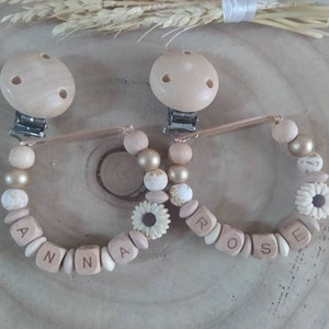 Personalized beige daisy gold silicone and wood pacifier clip