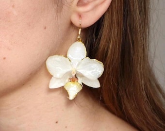 Natural resin orchid earrings, elegant handcrafted white orchid jewelry. Earrings with real orchid resin flowers set in them.