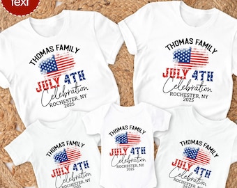 May include: Four white t-shirts with a red, white, and blue American flag design. The shirts say "Thomas Family July 4th Celebration Rochester, NY 2025".