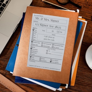 May include: A brown file folder with a white label attached. The label has a form for scheduling appointments with the text "Borrower Signer" at the top. The form includes fields for the borrower's name, address, time, notes, and confirmation options. The form also includes checkboxes for "Confirm Appt", "Sent Text", "Left Voicemail", "Reschedule Appt", "Cancel Appt", "NO Show", "Cash To Close", "Sale", "Purchase", "Refinance", "Reverse", "Other", "UPS", "FedEx", "Scans", "No Scans", "One Signer", and "Two Signers".
