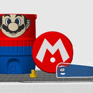 May include: A red, blue, and yellow Mario-themed container with a matching red and white logo. A blue strap-like object and a yellow piece are also present. The container features a Mario character face.