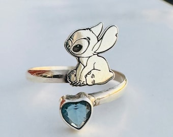 925 sterling silver, ring with blue cubic zirconia fits on any finger