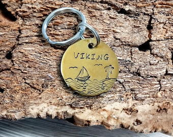 Gepersonaliseerde en handgegraveerde messing hondenpenning "Viking"