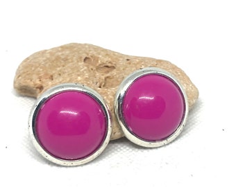 Vintage pink plastic circle clip on earrings