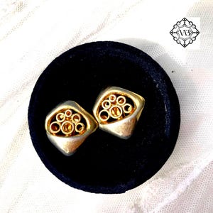 Vintage brutalist gold tone clip on earrings