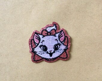 Kleine glitter Marie geborduurde patch