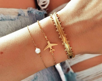 Vliegtuigarmband goud / Reisarmband goud / Reiswereldarmband / Vakantiereisarmband goud / Armband vrienden / Cadeau idee armband