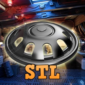 Könnte beinhalten: Eine schwarze Kunststoff-Radkappe mit fünf Speichen und einer zentralen Kappe. Die Radkappe ist scharf, der Hintergrund ist verschwommen. Der Text "STL" ist im Vordergrund sichtbar.