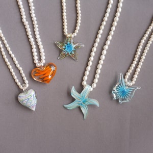 fresh water pearls with lampwork glass sea star ,butterfly ,heart pendant hand made necklace,